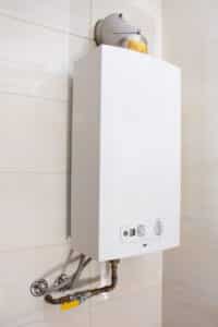 Tankless water heater mounted on a wall